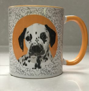 Mug with spot icon of dog on a swirl background with coloured handles