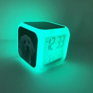 dog digital clock lighting up in green